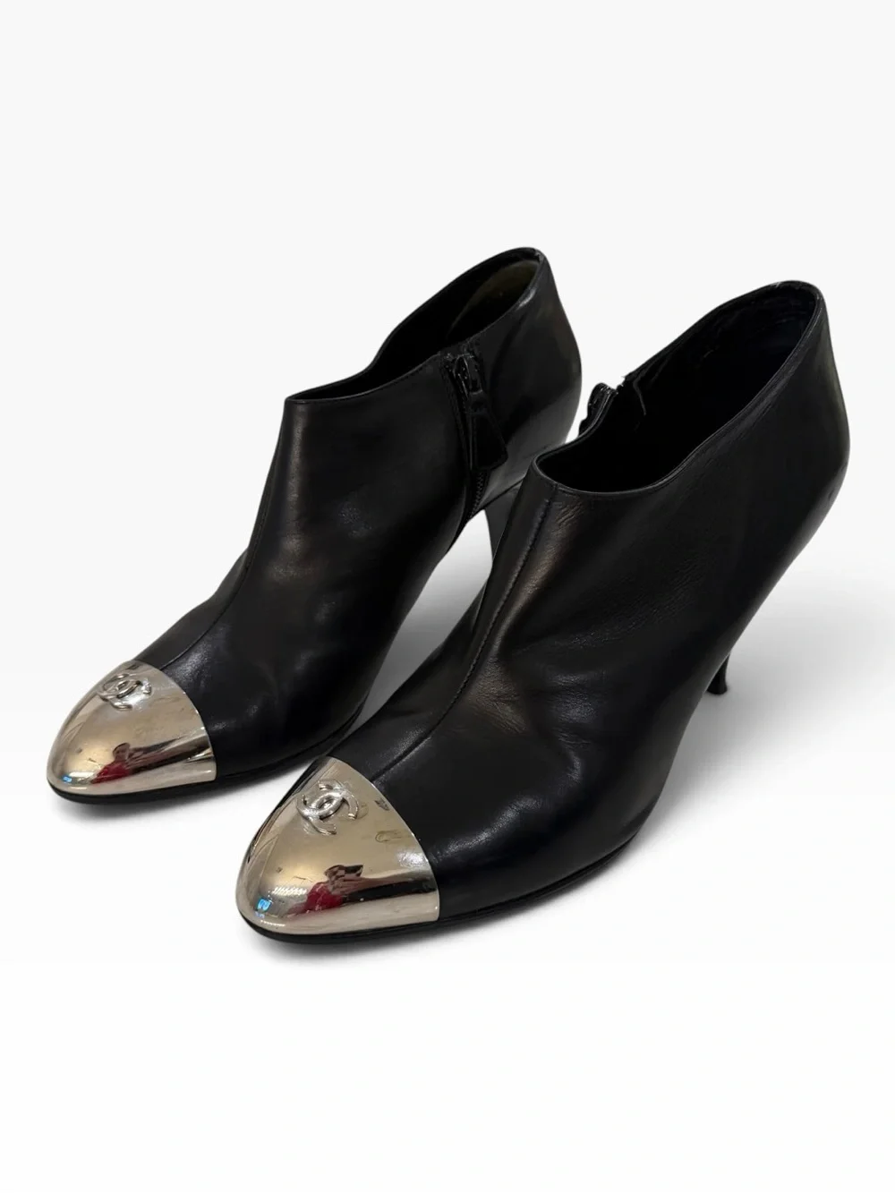 CHANEL Black Leather Ankle Boots with Silver Cap Toe Logo